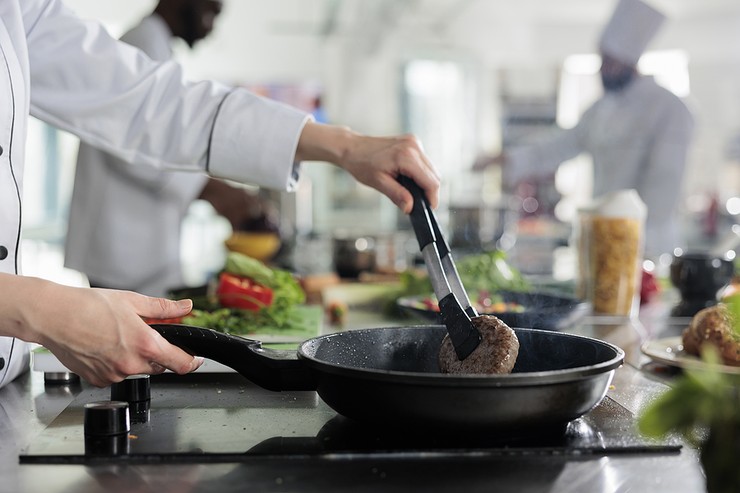 Chefs Working in Kitchen